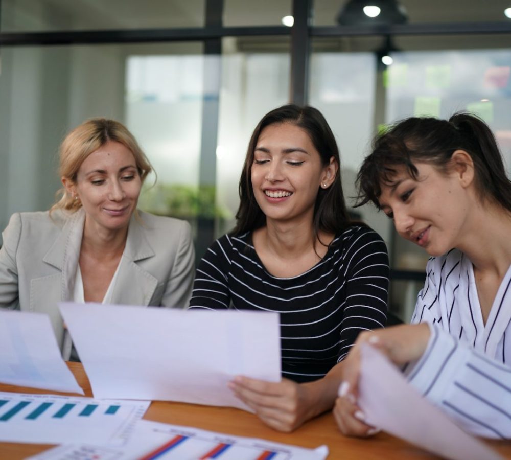 businesswoman-making-business-presentation-for-colleagues-in-modern-office-e1670796037246.jpg